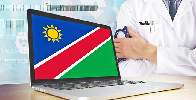 Flagge Namibias auf Laptop mit Arzt