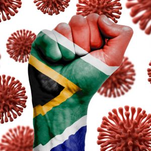 Faust mit Flagge Südafrika vor Coronaviren